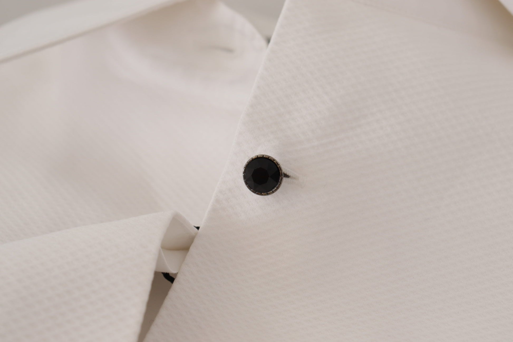Dolce & Gabbana Elegant Sleeveless Tuxedo Blouse with Crystal Buttons - ACCEXO
