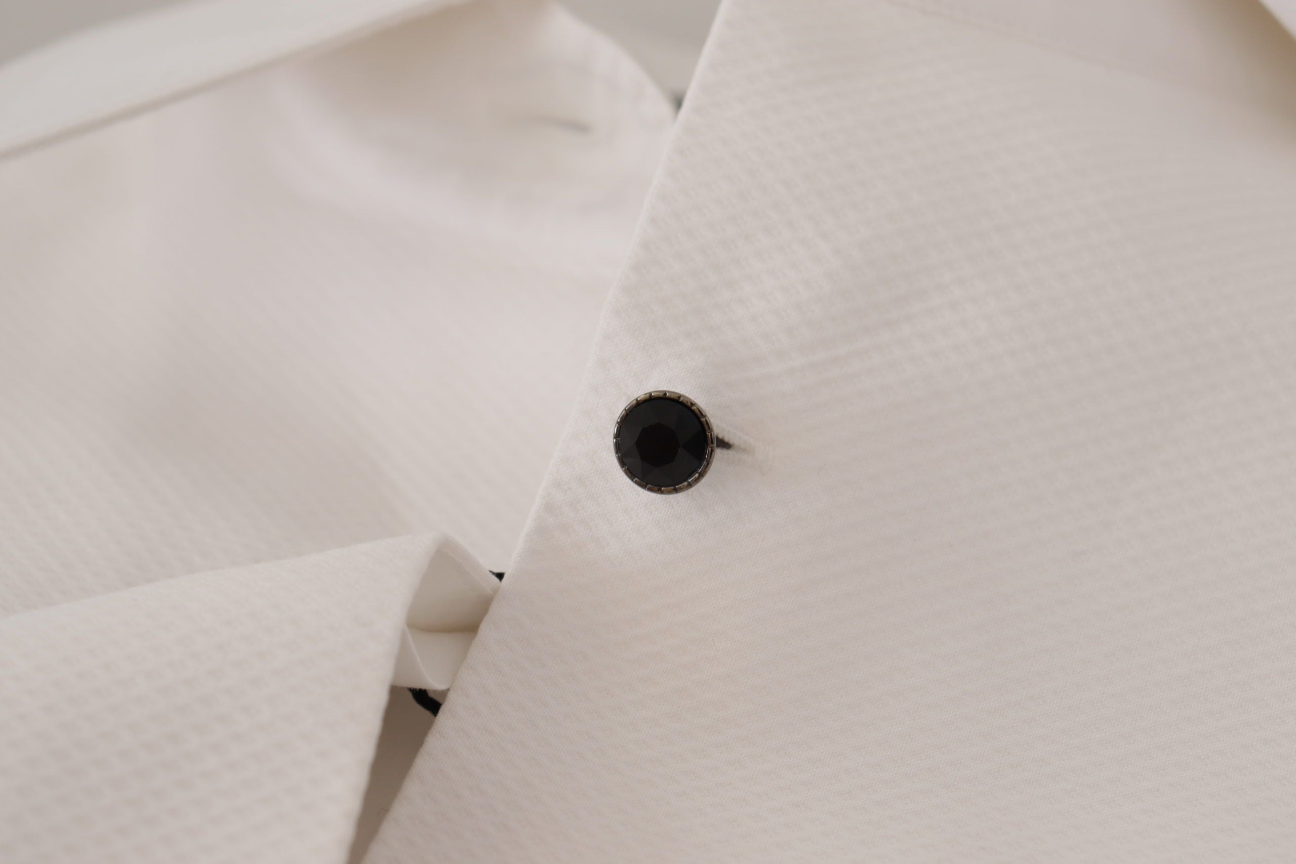 Dolce & Gabbana Elegant Sleeveless Tuxedo Blouse with Crystal Buttons - ACCEXO