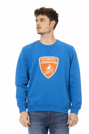 Man wearing a blue sweatshirt with a Lamborghini logo on a white background