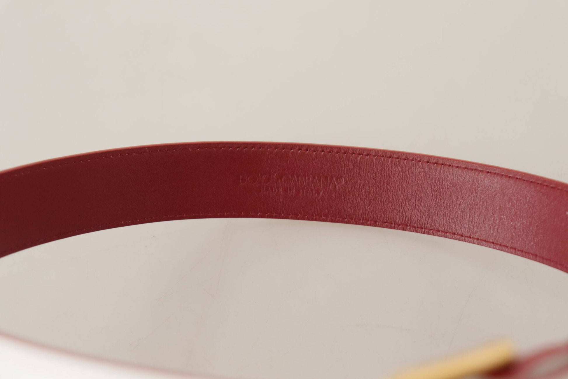 Dolce & Gabbana Elegant White Leather Belt with Engraved Buckle - ACCEXO