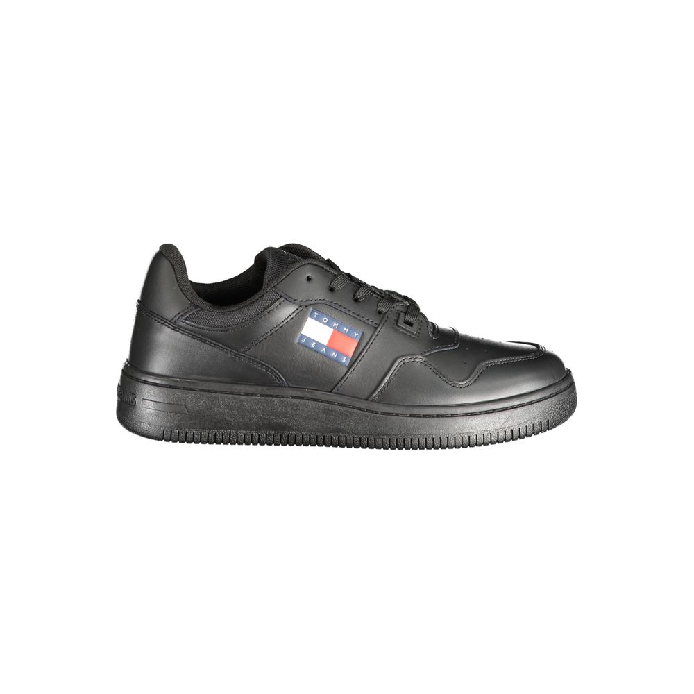 Black sneaker with a brand logo on a white background