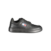 Black sneaker with a brand logo on a white background