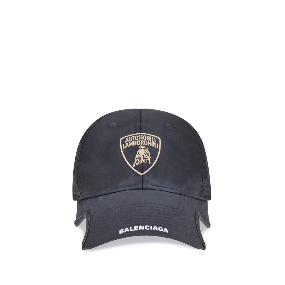 Black cap with Lamborghini logo and Balenciaga branding on a white background