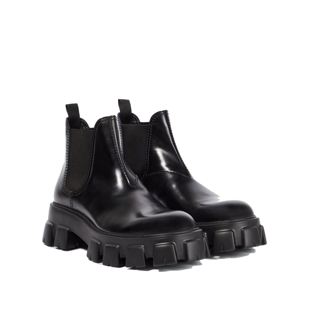 Prada Monolith Leather Ankle Boots - ACCEXO