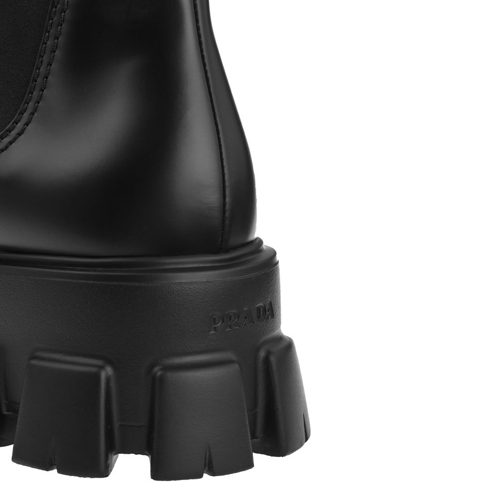 Prada Monolith Leather Ankle Boots - ACCEXO