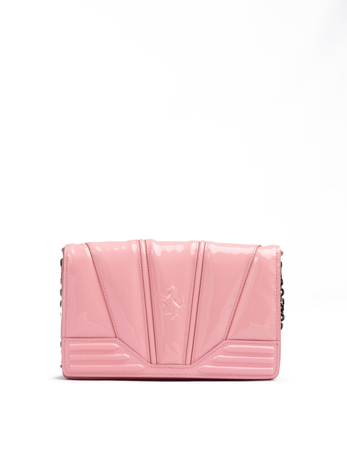 Pink clutch bag with geometric design on a white background.