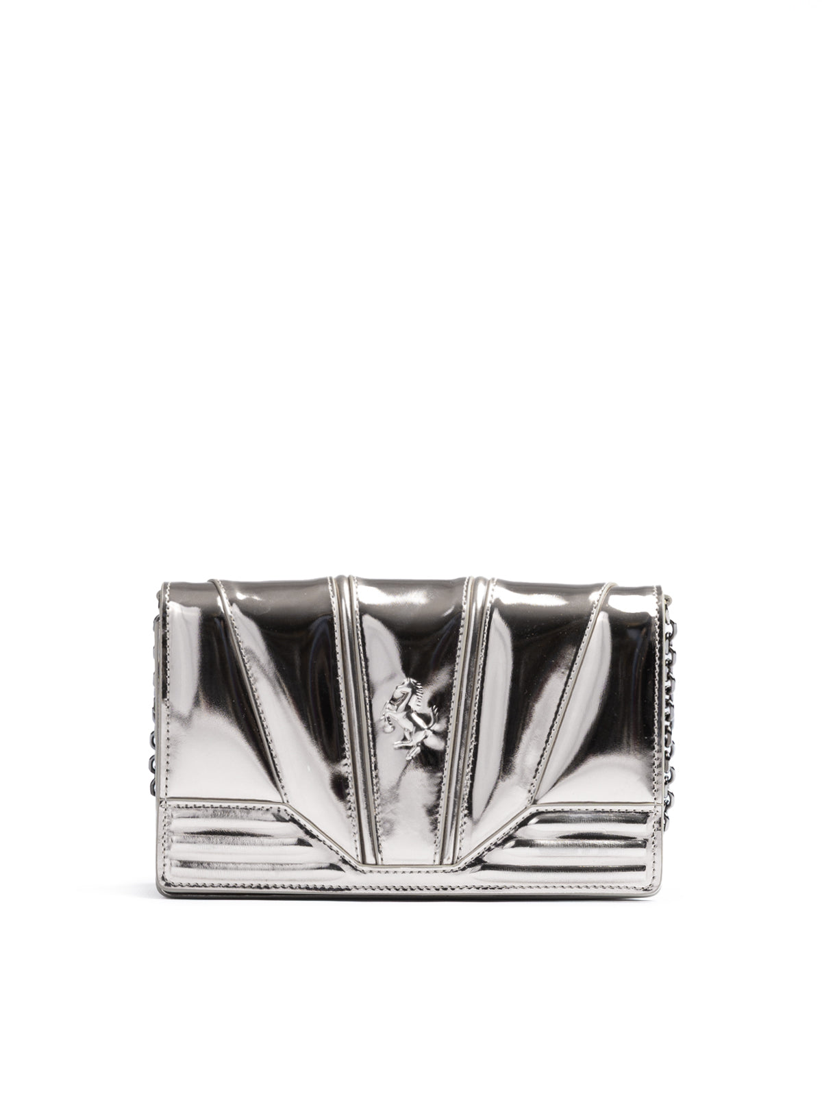 Silver metallic clutch bag on a white background