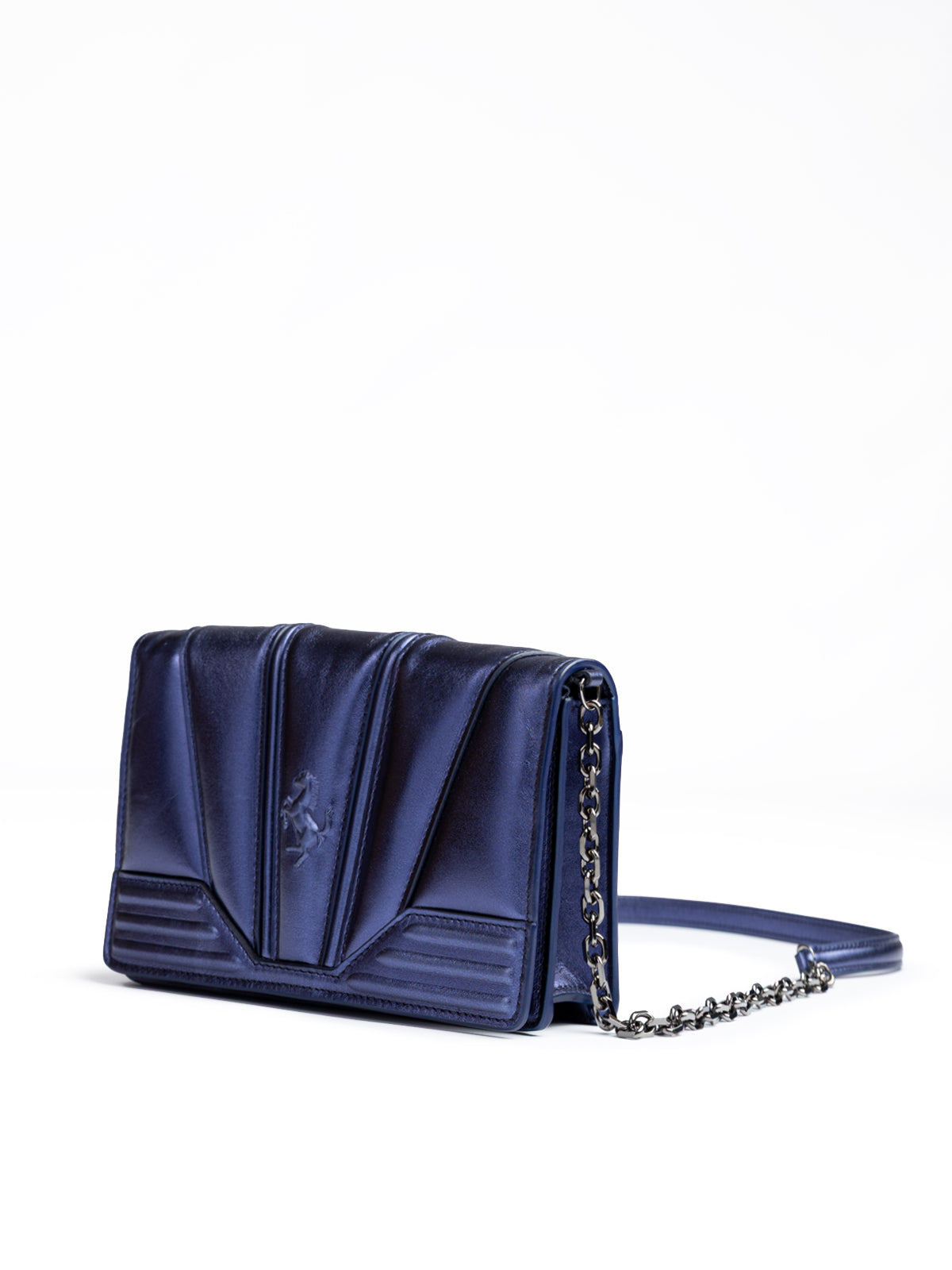 Blue handbag with a chain strap on a white background