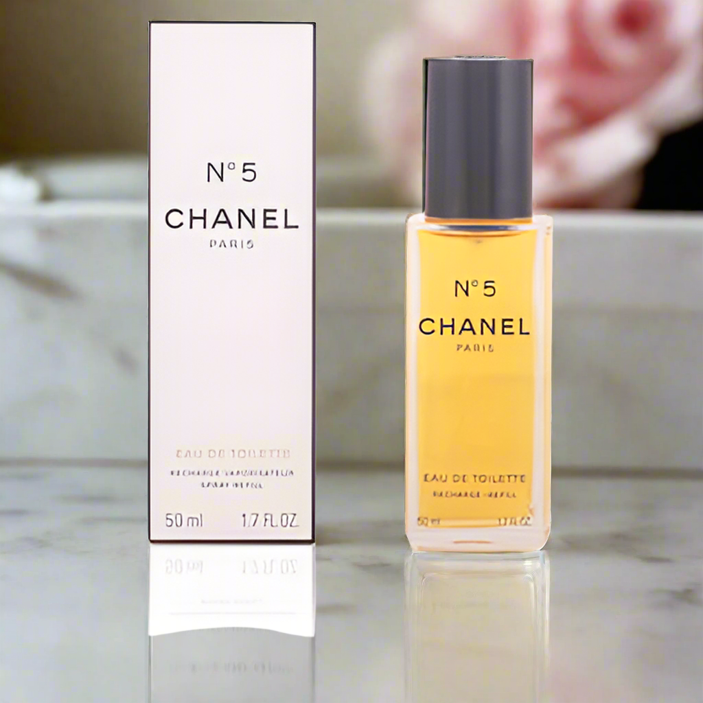 A bottle of CHANEL No. 5 Eau de Toilette spray with its packaging box, displaying the product name and brand.