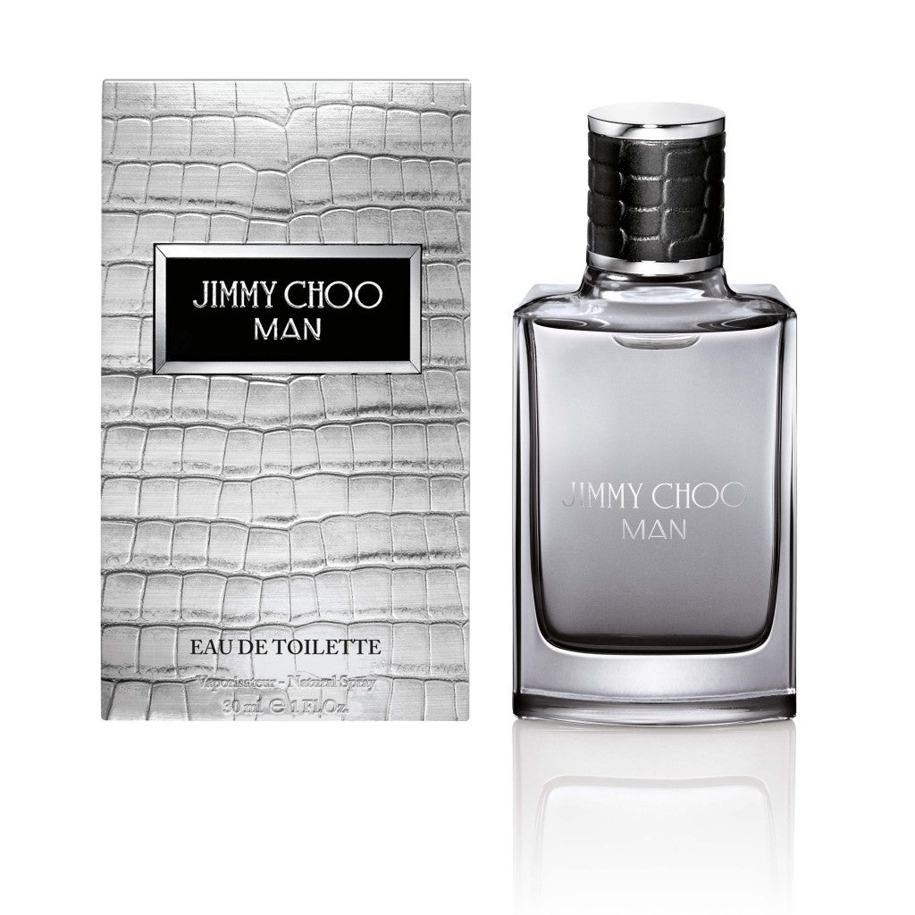 This image features the JIMMY CHOO MAN 1 OZ EAU DE TOILETTE SPRAY, presented in a sleek and sophisticated bottle with a stylish textured box. The eau de toilette is designed for men, crafted by the renowned fashion designer Jimmy Choo.