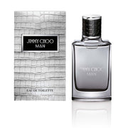 This image features the JIMMY CHOO MAN 1 OZ EAU DE TOILETTE SPRAY, presented in a sleek and sophisticated bottle with a stylish textured box. The eau de toilette is designed for men, crafted by the renowned fashion designer Jimmy Choo.