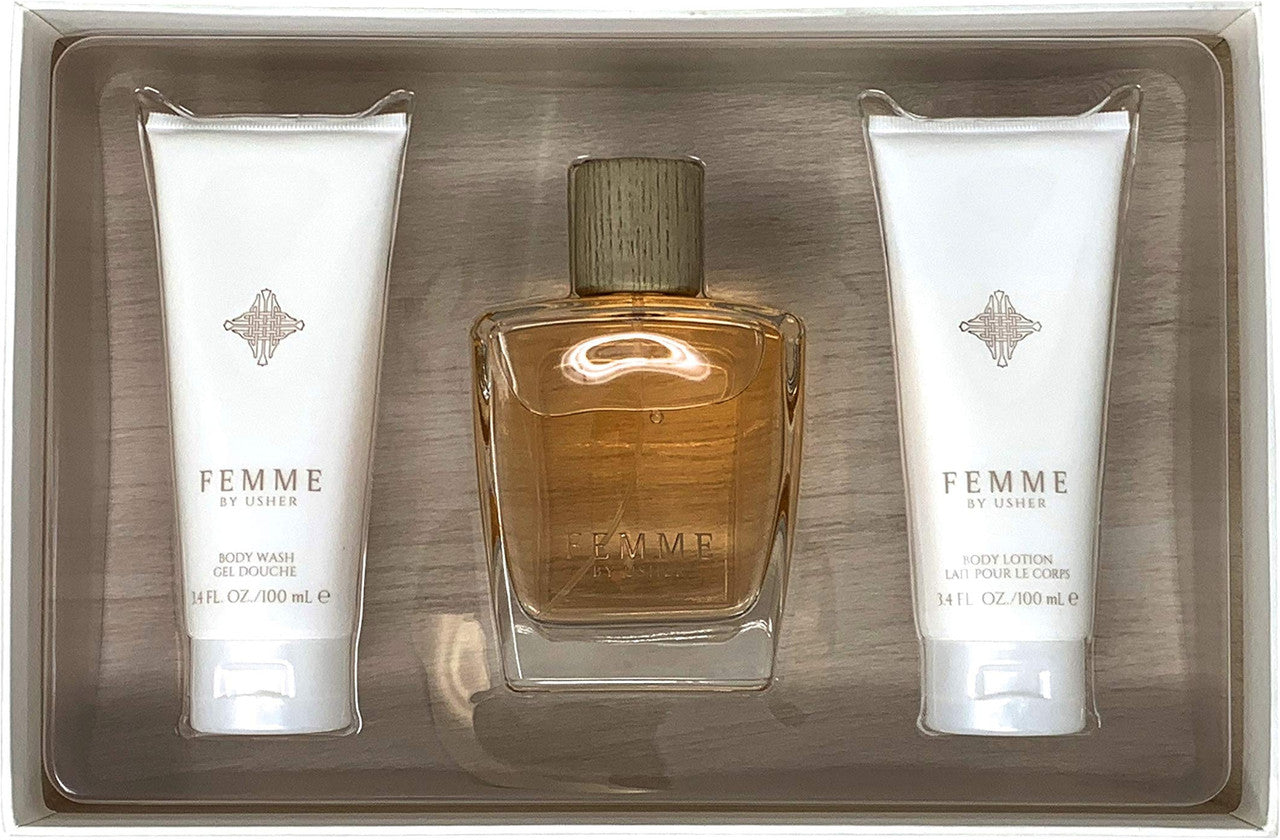 A 3-piece set of USHER FEMME cologne, with a bottle of eau de parfum and two tubes of body care products, all presented in a clear box.