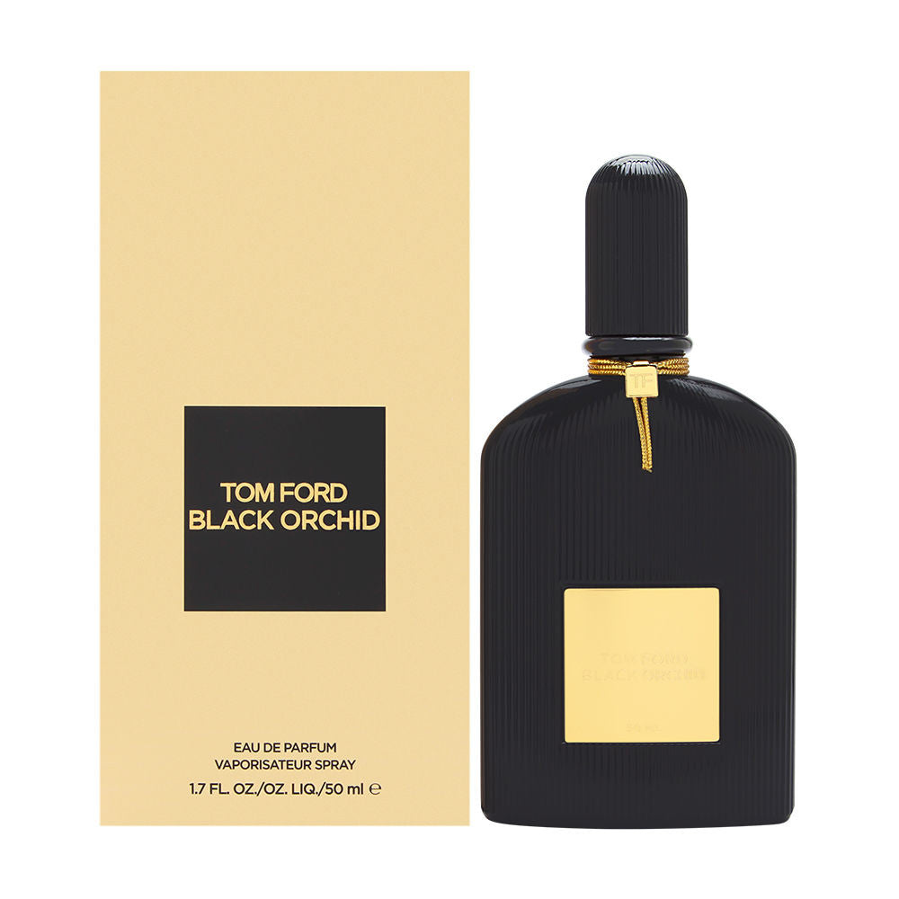 A black bottle of TOM FORD BLACK ORCHID EAU DE PARFUM SPRAY with a gold label, next to its beige packaging box.
