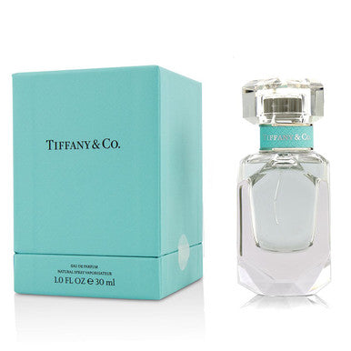 A product image featuring a Tiffany & Co. eau de parfum spray bottle for women, along with its blue packaging box.
