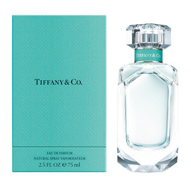 A bottle of TIFFANY & CO. eau de parfum spray for women next to its blue box packaging.