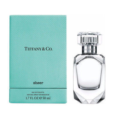 Tiffany & Co. Sheer eau de toilette spray bottle next to its blue box packaging.
