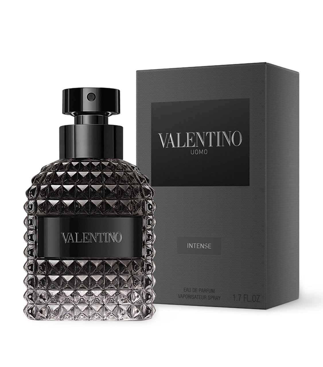 A black bottle of VALENTINO UOMO INTENSE EAU DE PARFUM SPRAY with a textured design, displayed next to its black box packaging.