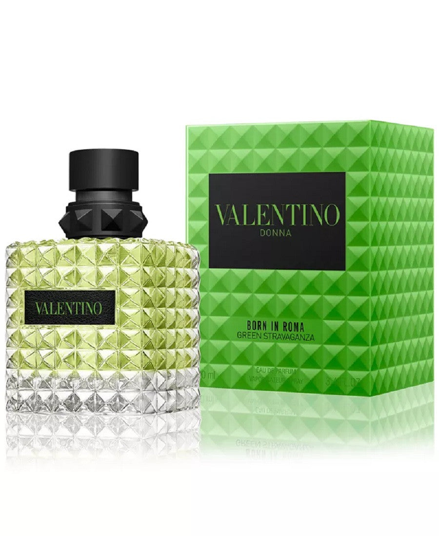 A green-colored bottle of VALENTINO DONNA BORN IN ROMA GREEN STRAVAGANZA eau de parfum spray next to its box.