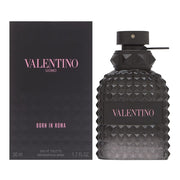 Valentino Uomo Born in Roma eau de toilette spray bottle alongside its packaging box.