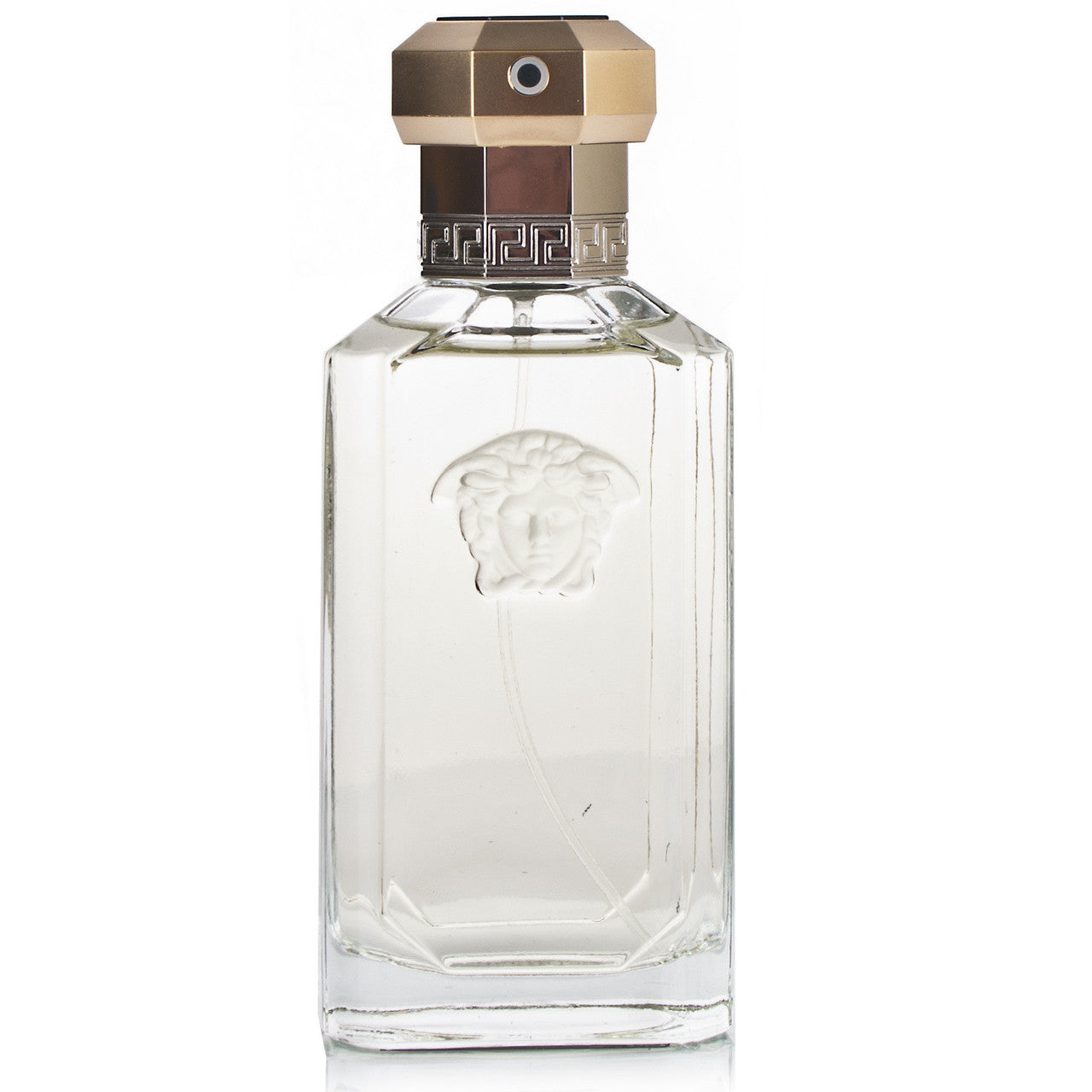 A clear glass bottle of VERSACE DREAMER tester edition eau de toilette spray for men, with a gold-colored cap and the Versace logo on the bottle.