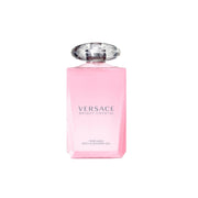 A pink bottle of VERSACE BRIGHT CRYSTAL bath and shower gel for women with a clear cap.