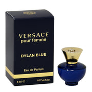 A Versace Dylan Blue Eau de Parfum mini bottle for women alongside its black box with gold accents. The box has the text 'VERSACE pour femme' and the fragrance name 'DYLAN BLUE' on it.