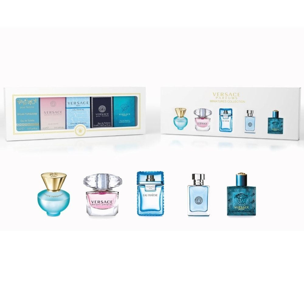 A collection of five VERSACE perfume bottles in a mini set, displayed in front of their packaging. The set includes varying shades of blue and white boxes, each with a small perfume bottle in front of them, representing the different fragrances in the set.
