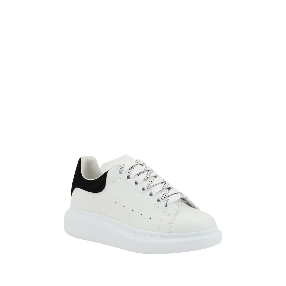 White Alexander McQueen sneaker featuring a stylish black heel for modern casual wear