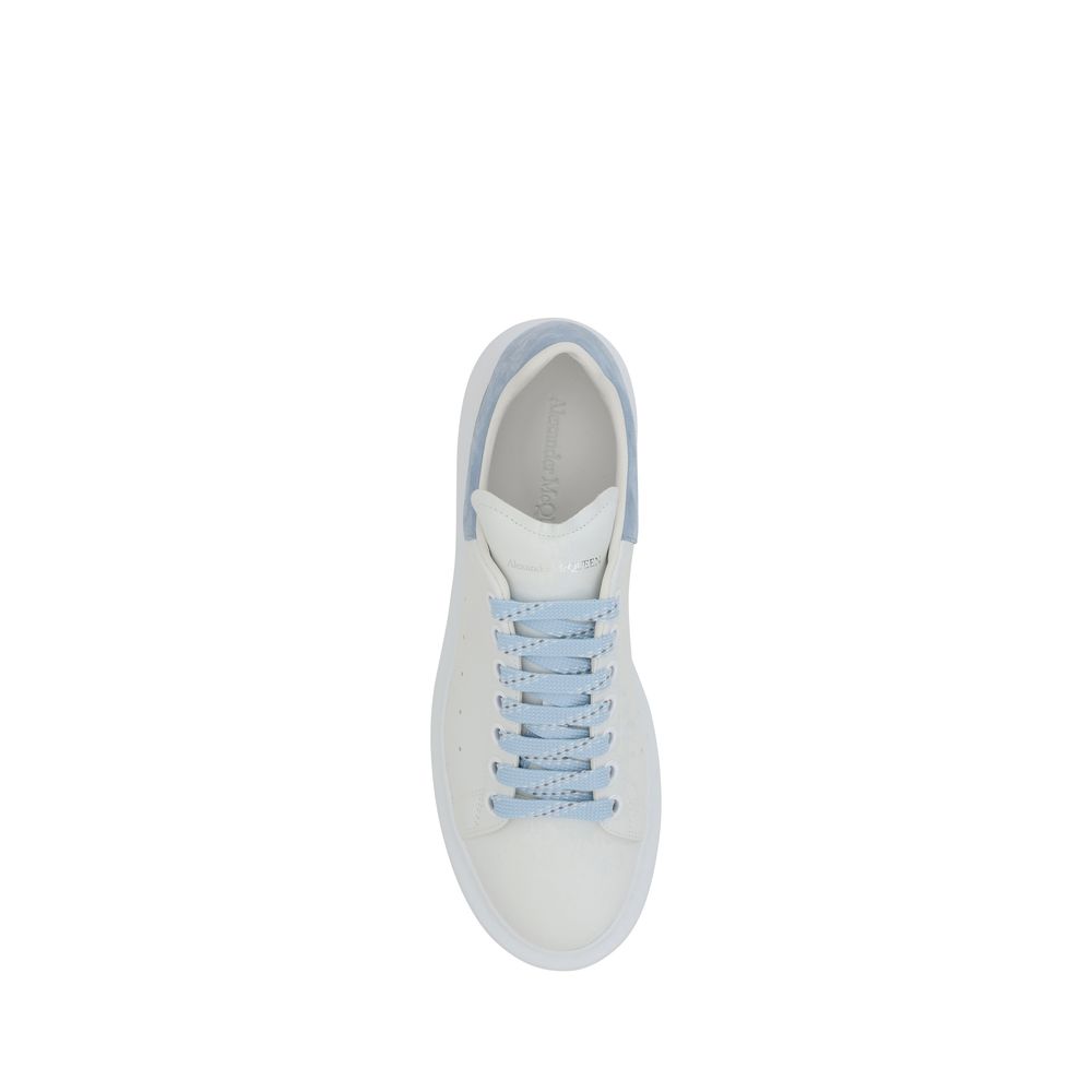 White Alexander McQueen sneaker with light blue laces for a stylish look