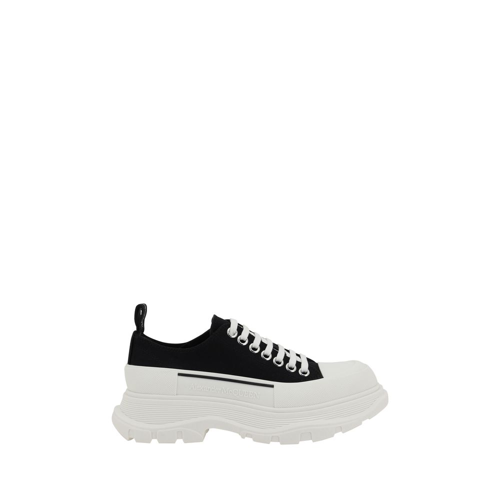 Black and white Alexander McQueen Sneakers featuring a reinforced round toe design