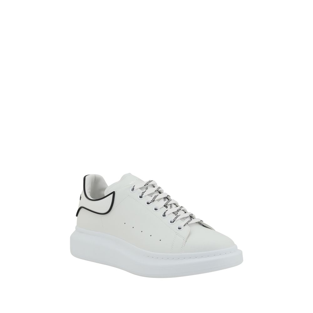 White leather Alexander McQueen sneakers with black trim for stylish footwear