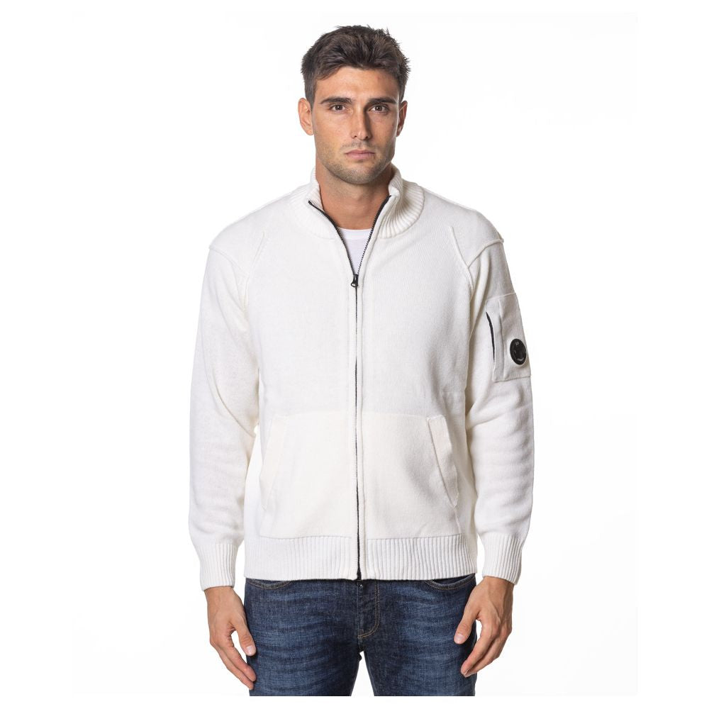 Man wearing C.P. Company white wool sweater with zip-up cardigan style