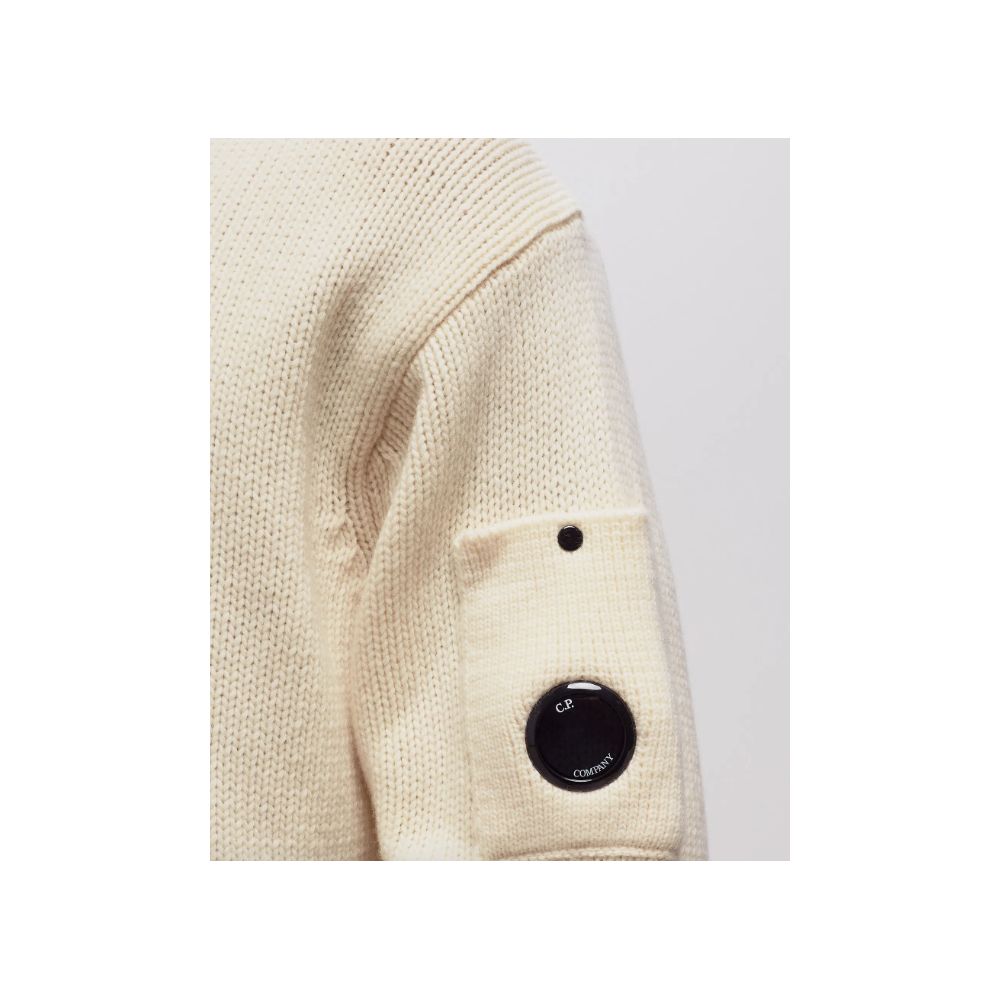 Cream-colored knit sweater with arm pocket from C.P. Company’s White Wool Sweater collection