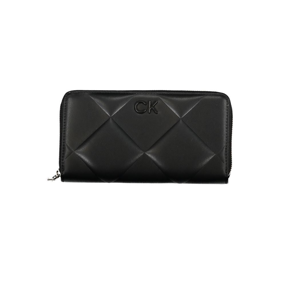 Black quilted Calvin Klein wallet with zipper, perfect for everyday use