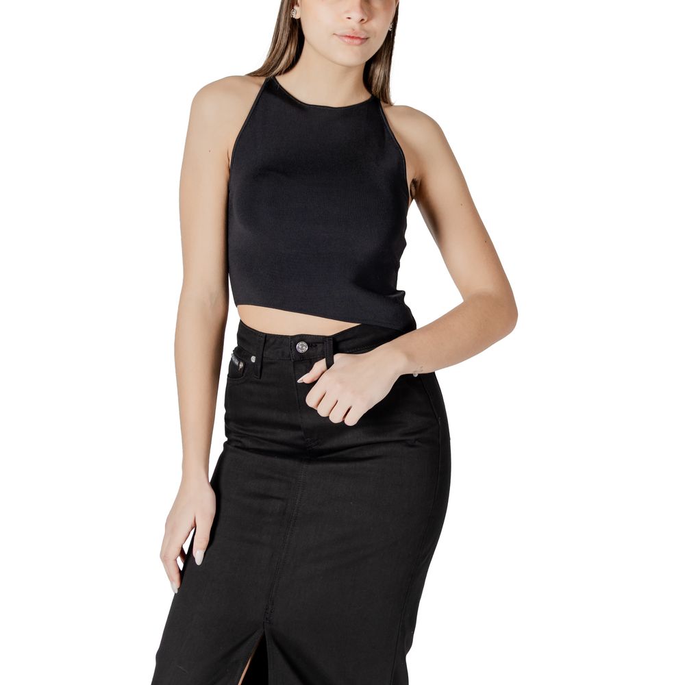 Woman in black halter top and skirt showcasing Calvin Klein Jeans black rayon tops