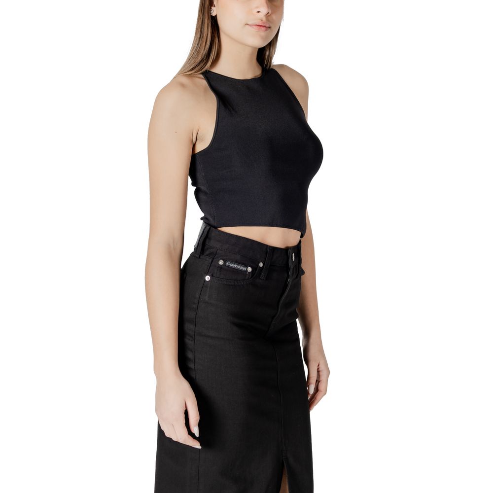 Woman in black top and skirt featuring Calvin Klein Jeans black rayon tops design