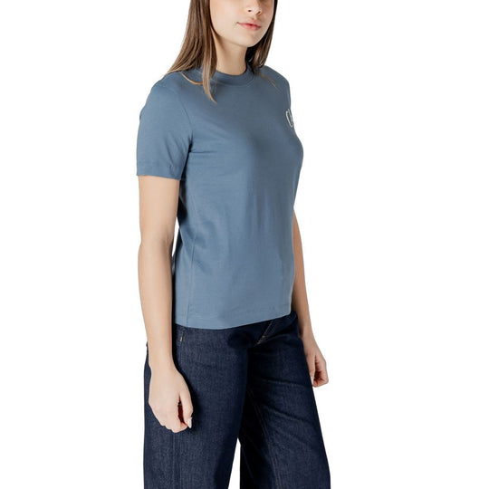 Woman in Blue T-Shirt and Dark Blue Pants from Calvin Klein Jeans Cotton Rigenerato Tops