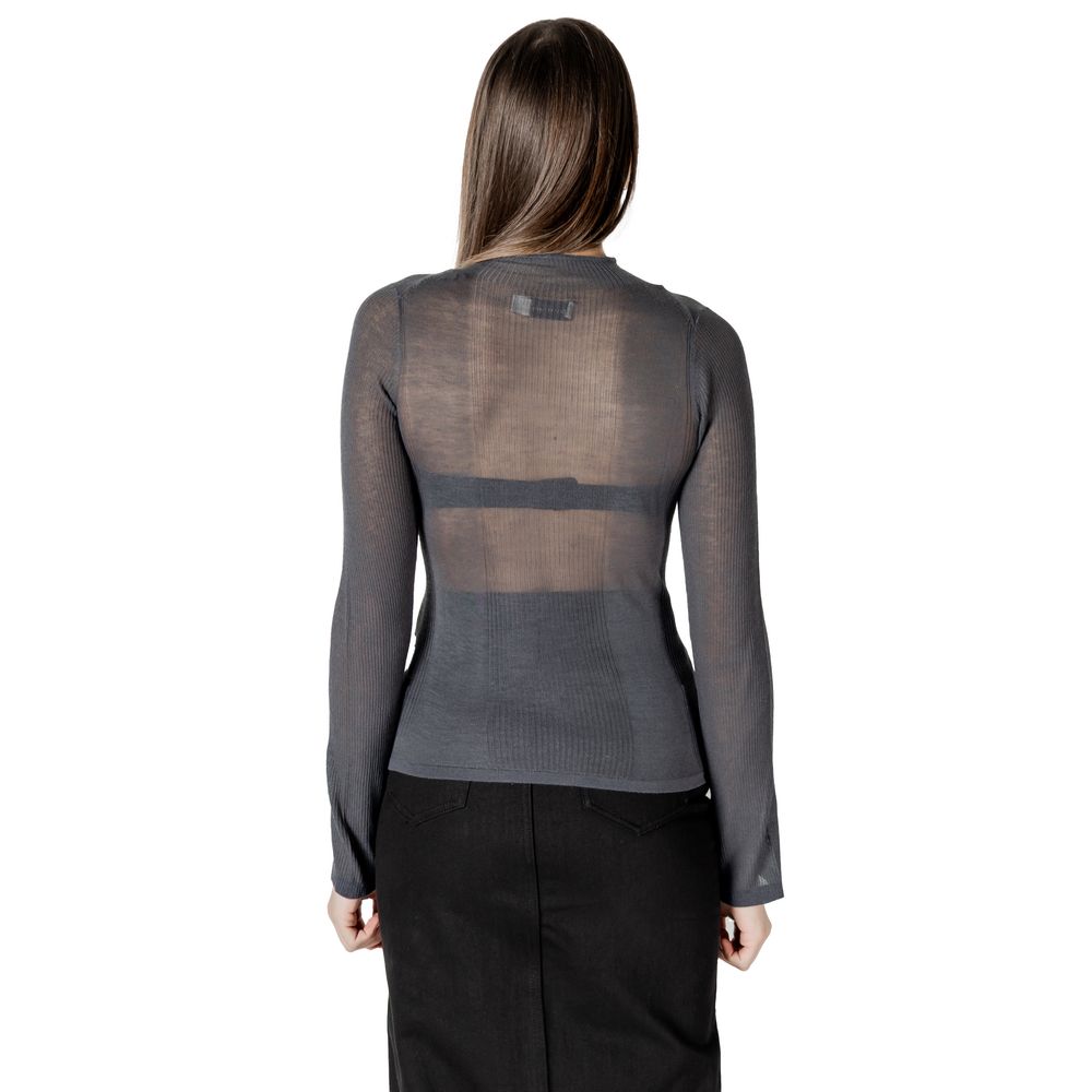 Woman’s sheer long-sleeved top from Calvin Klein Jeans in gray acrylic fabric