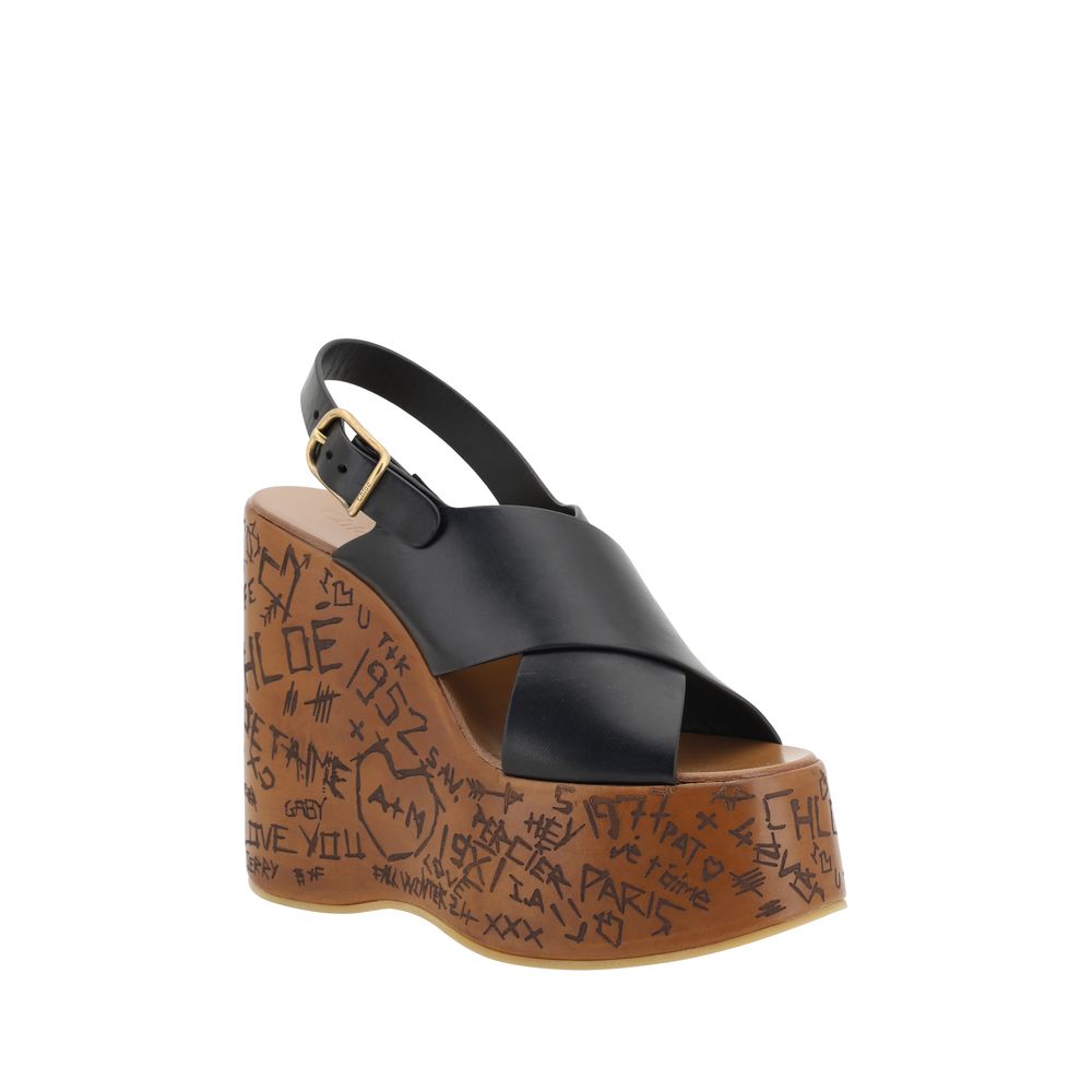 Black leather wedge sandal featuring Chloé Maxime Sandals stylish design