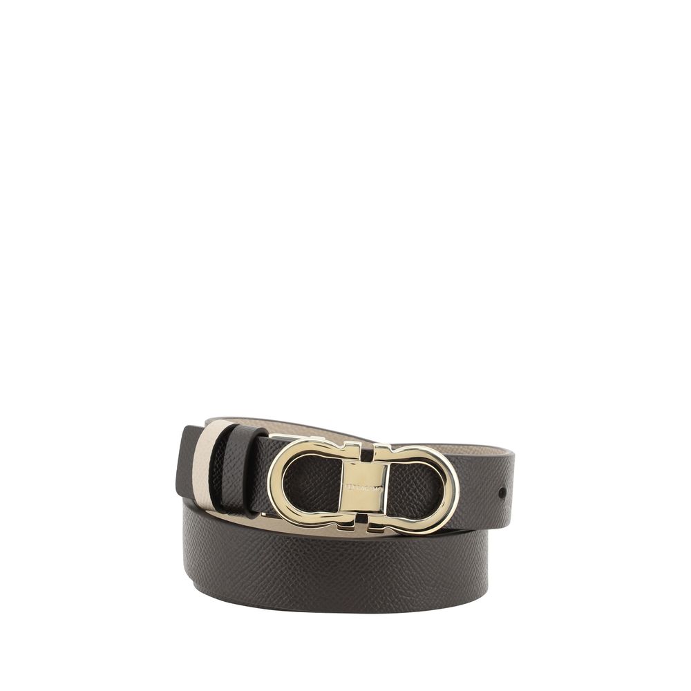 Black leather Ferragamo reversible belt featuring a stylish silver buckle