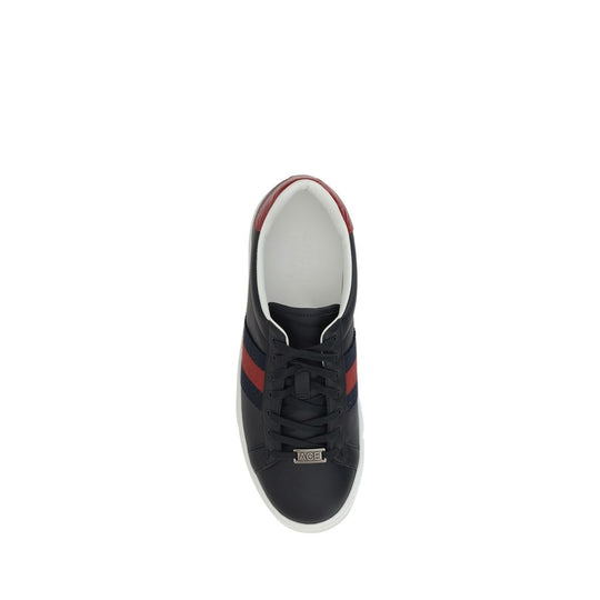 Black Gucci leather sneakers with red stripes for stylish comfort and versatility