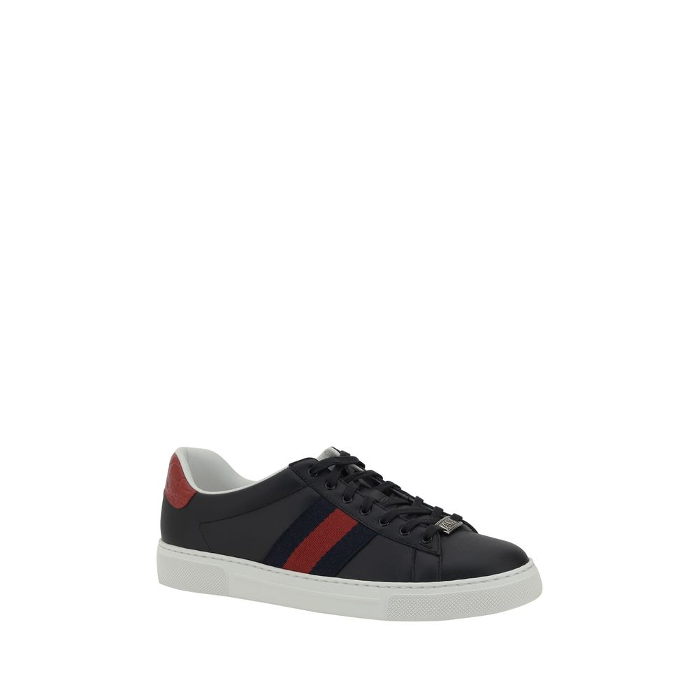 Black leather sneakers with red stripe from Gucci, stylish and luxurious footwear