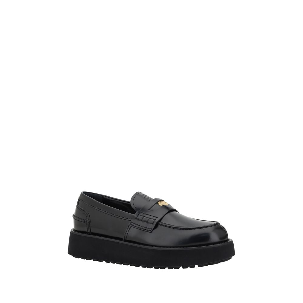 Black leather platform loafer from Miu Miu Leather Loafers collection for stylish footwear