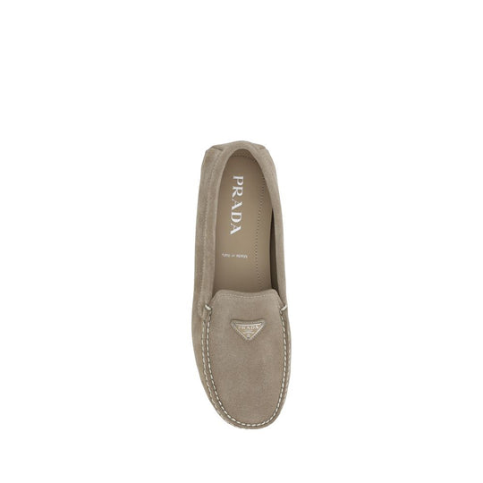 Taupe suede Prada loafers showcasing elegant design and luxury craftsmanship