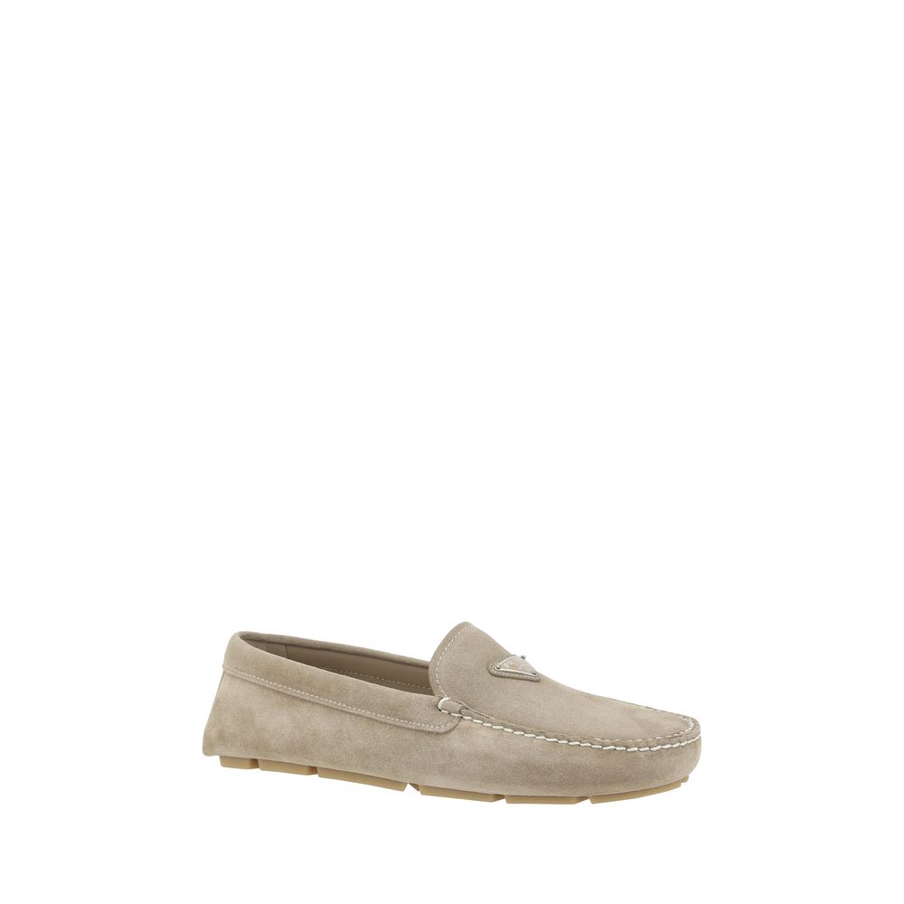 Beige suede loafers from Prada showcasing luxurious craftsmanship and comfort