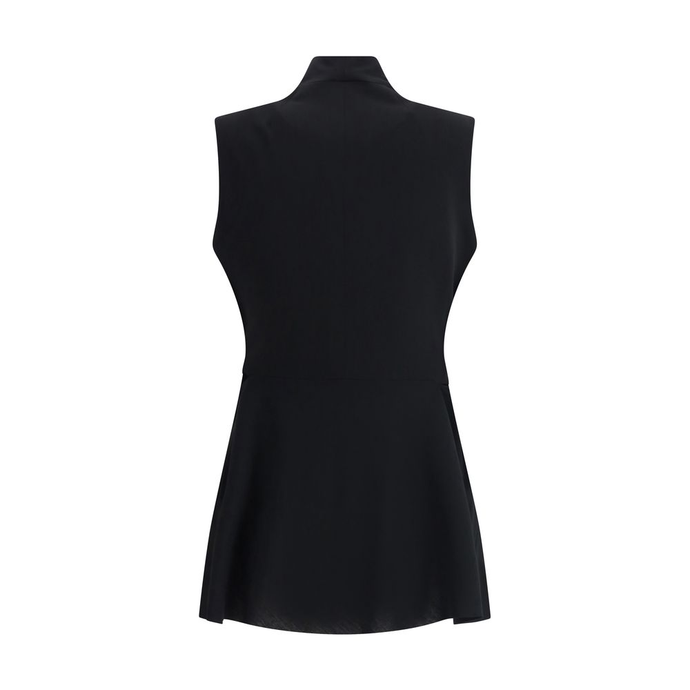 Sleeveless black dress styled with Rick Owens Wool Vest for modern elegance