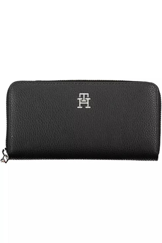 Black Tommy Hilfiger zippered wallet featuring a stylish logo design