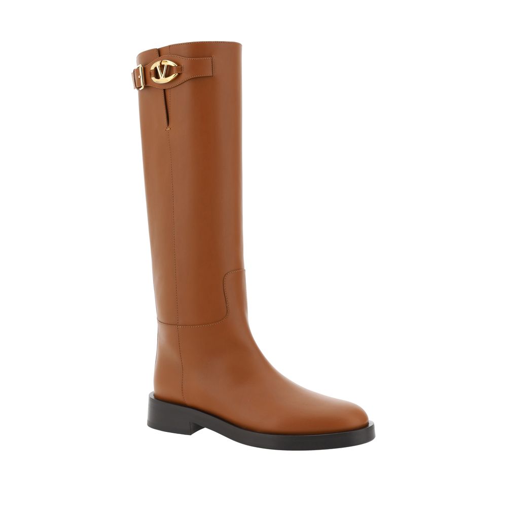 Brown leather knee-high Valentino Garavani boots showcasing elegant equestrian style