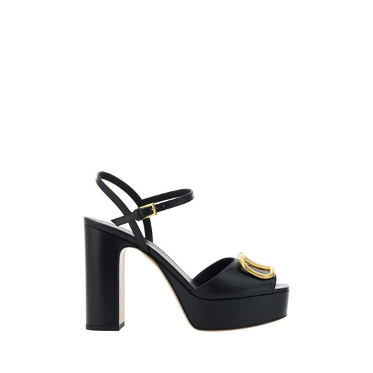 Black platform sandal with gold buckle from Valentino Garavani Logoed Sandals