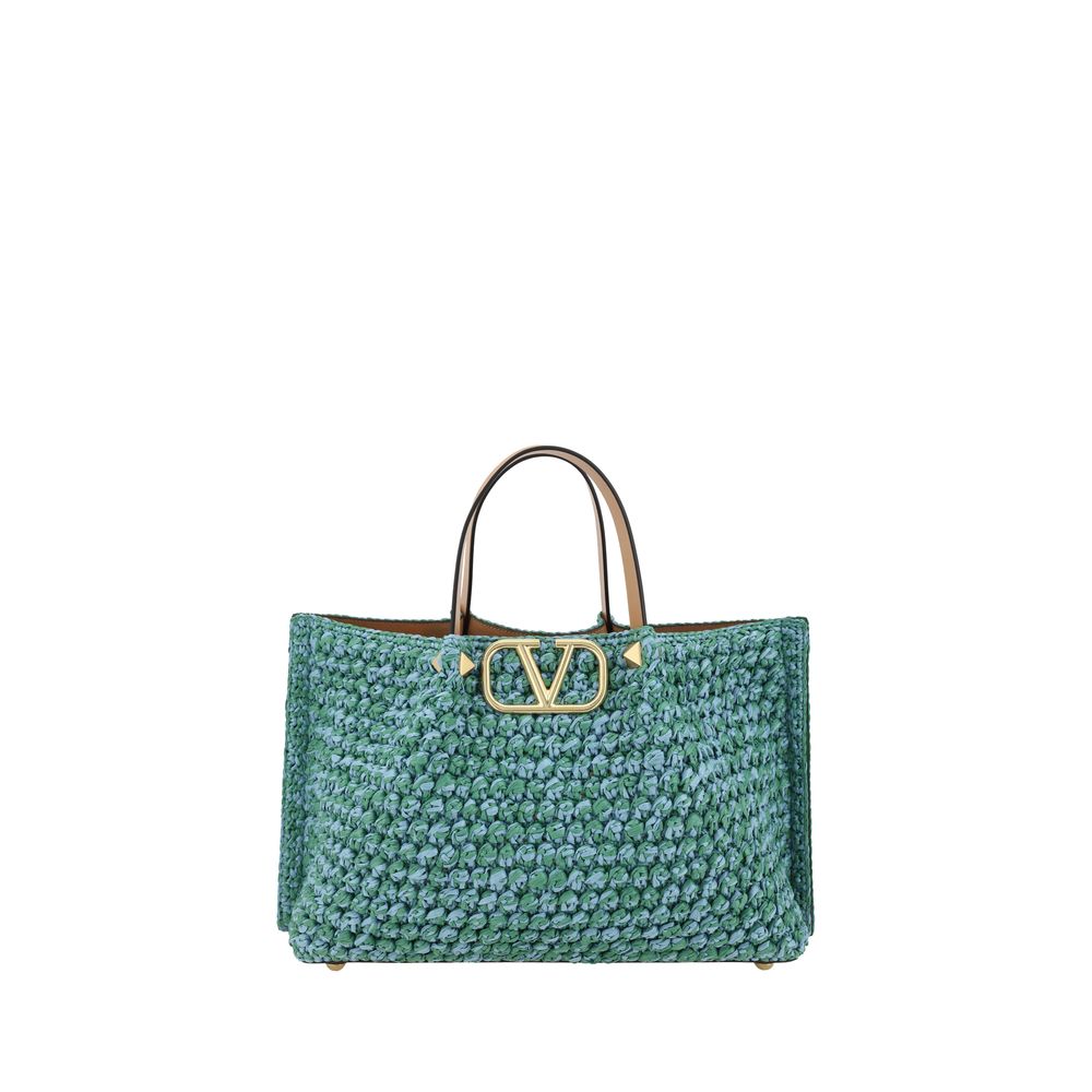 Green woven Valentino Garavani Raffia Tote Bag, perfect for stylish summer outings